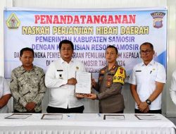 Bupati Dan Kapolres Samosir Teken NPHD  