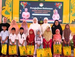Uke Retno Faisal Hasrimy  Santuni  122 anak yatim Bersama DWP Langkat
