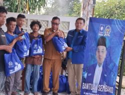 Ketua Komisi VII DPR RI Salurkan Bantuan Pangan kepada Warga Desa Pancur Batu.